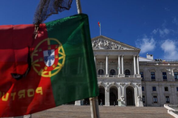 104959303-a-portuguese-flag-flies-in-front-of-the-parliament-in-lisbon-on-november-7-2023-portugals.jpg
