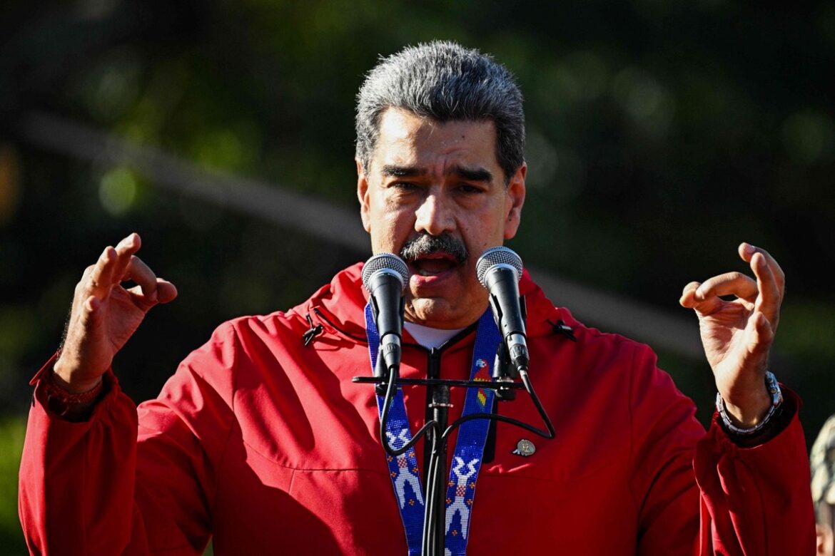 112677057-venezuelas-president-nicolas-maduro-speaks-during-a-march-to-commemorate-the-day-of-i.jpg